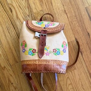 Floral tooled Leather Backpack